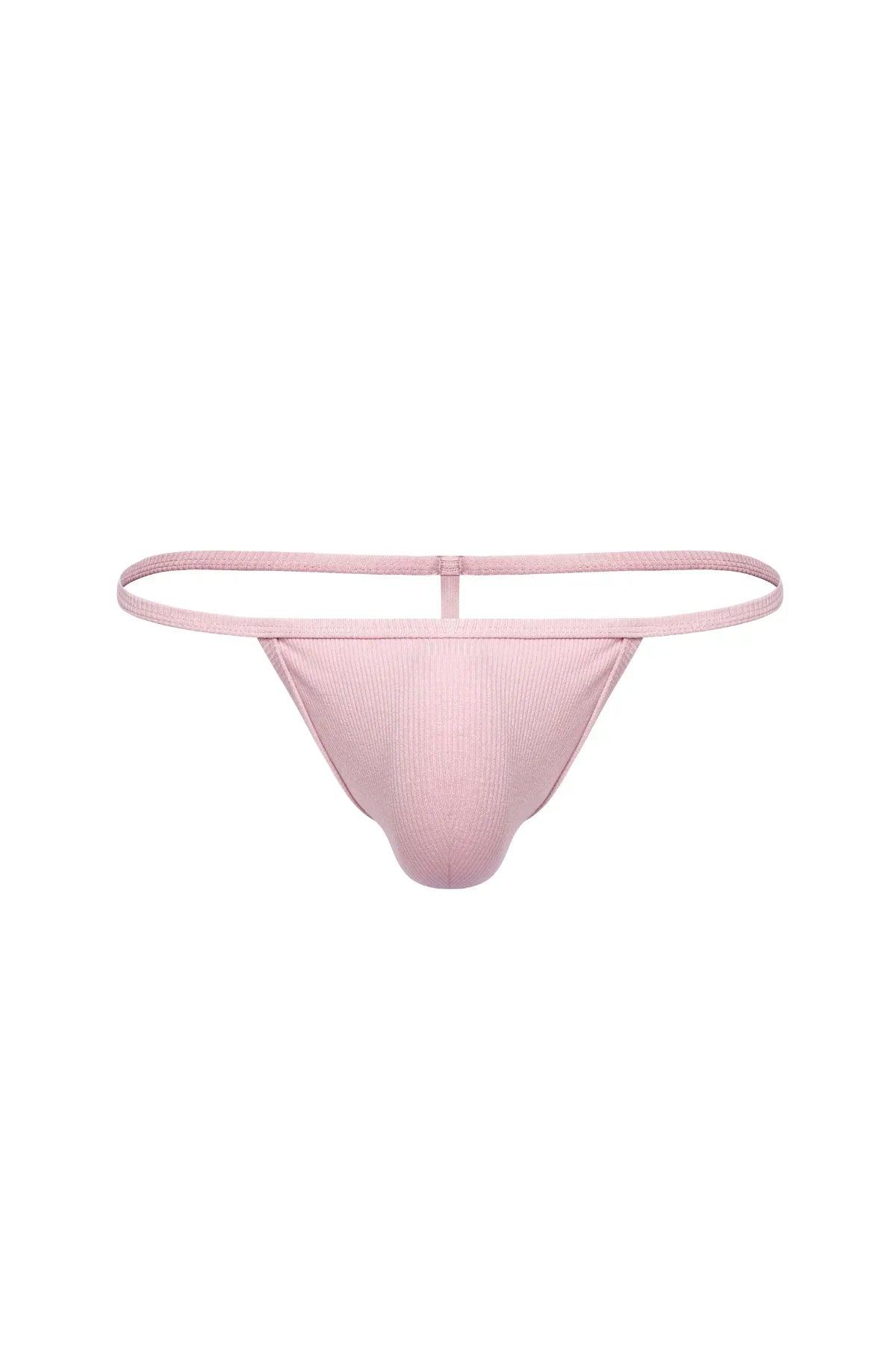 Pink ribbed men's thong underwear with minimal waistband, front view on white background