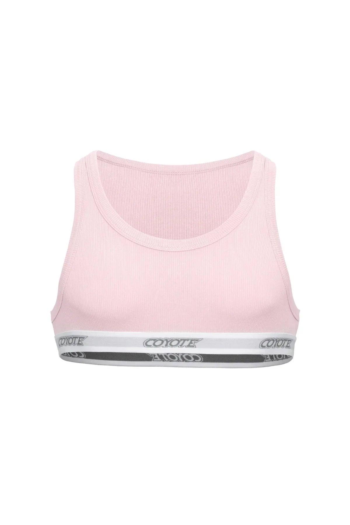 Light pink men's cropped tank top with ribbed texture and white elastic logo band