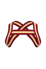 Burgundy harness with gold and white stripes, elastic straps crossed in front, LGBTQ+ fashion accessory