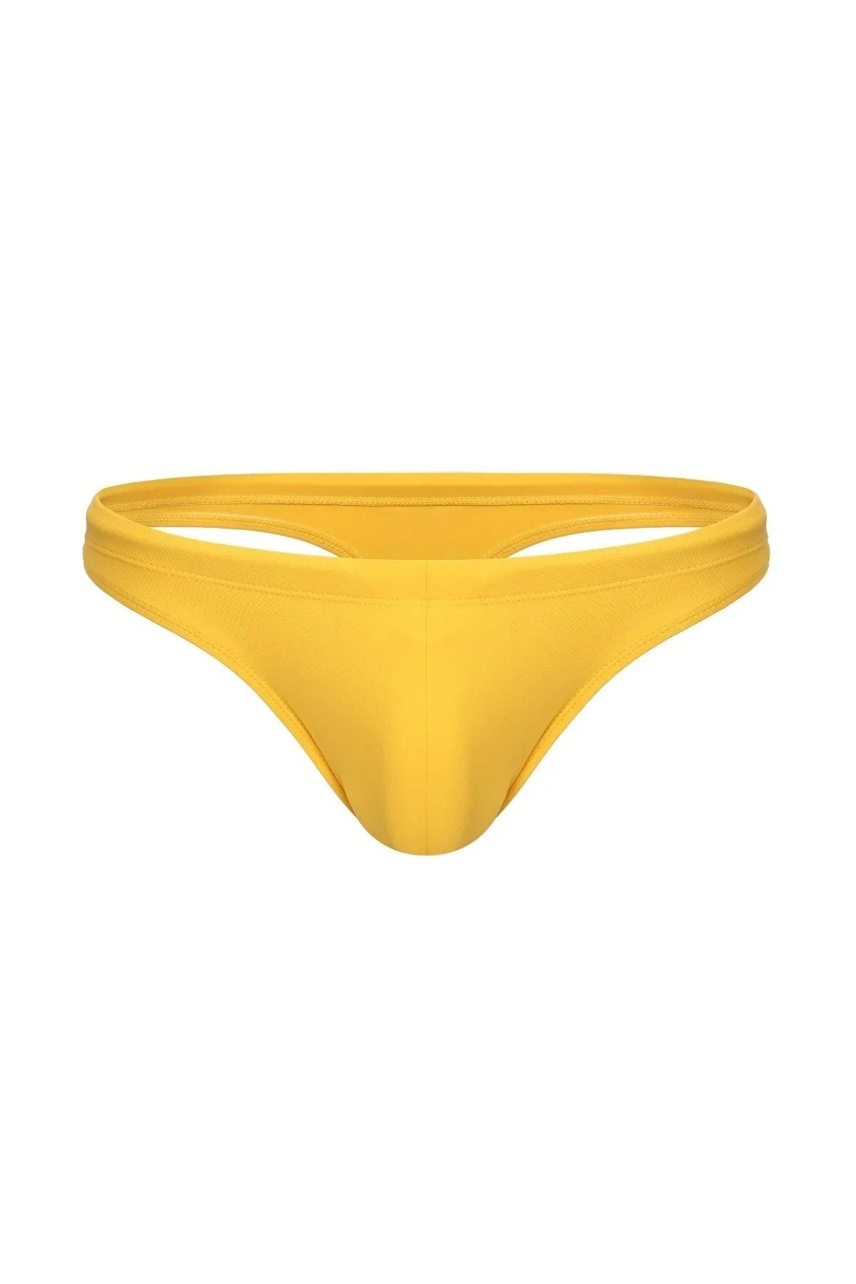 Bright yellow men's swim thong with low-rise cut and minimal coverage, isolated on white background