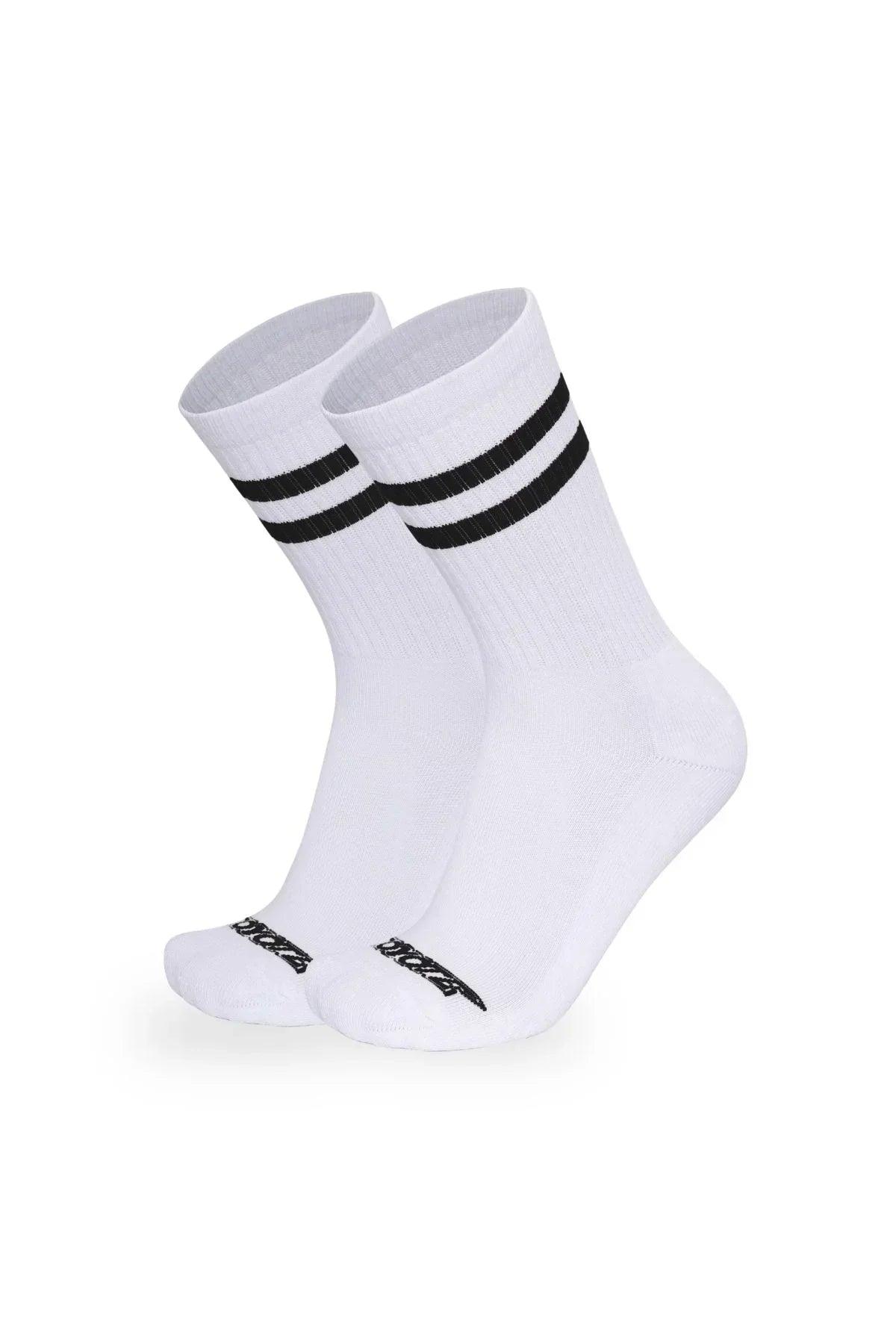Pair of white cotton ringer socks with black stripes and black logo detail on toes