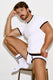 Man in white athletic underwear, white T-shirt with black trim, and white socks posing indoors