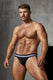 Athletic man modeling black men's underwear briefs with white waistband against a plain background