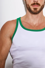Close-up of man wearing white tank top with green trim, masculine underwear model shot