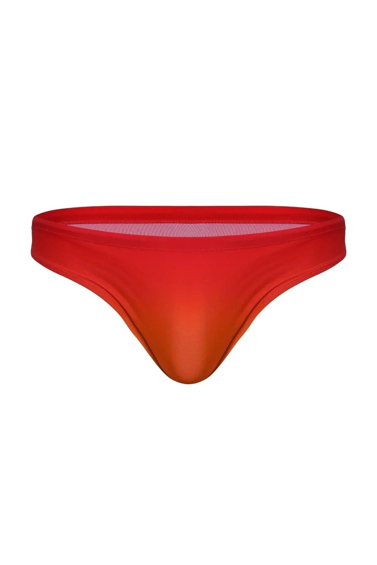 Men’s low-rise swim brief in gradient red and orange sunrise color, front view