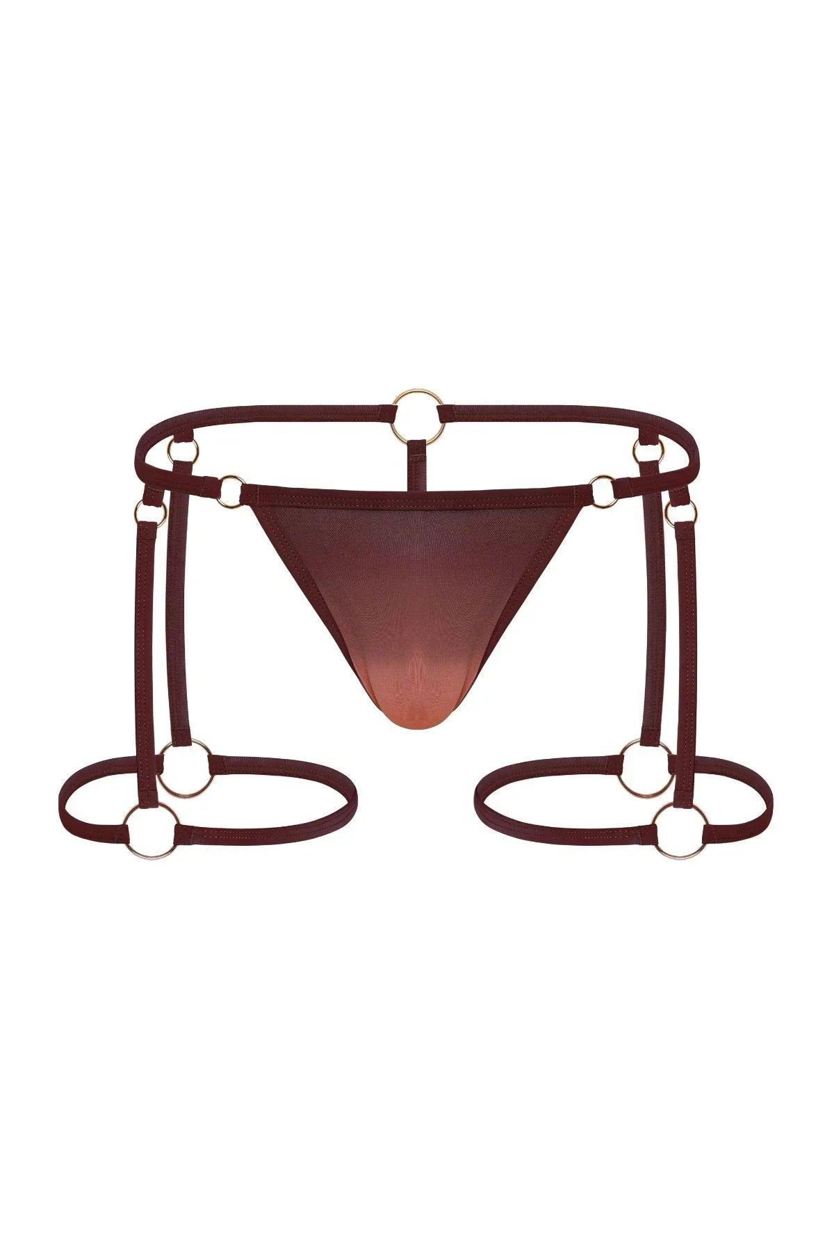 Bronze men's thong with harness straps and gold ring hardware, front view on white background