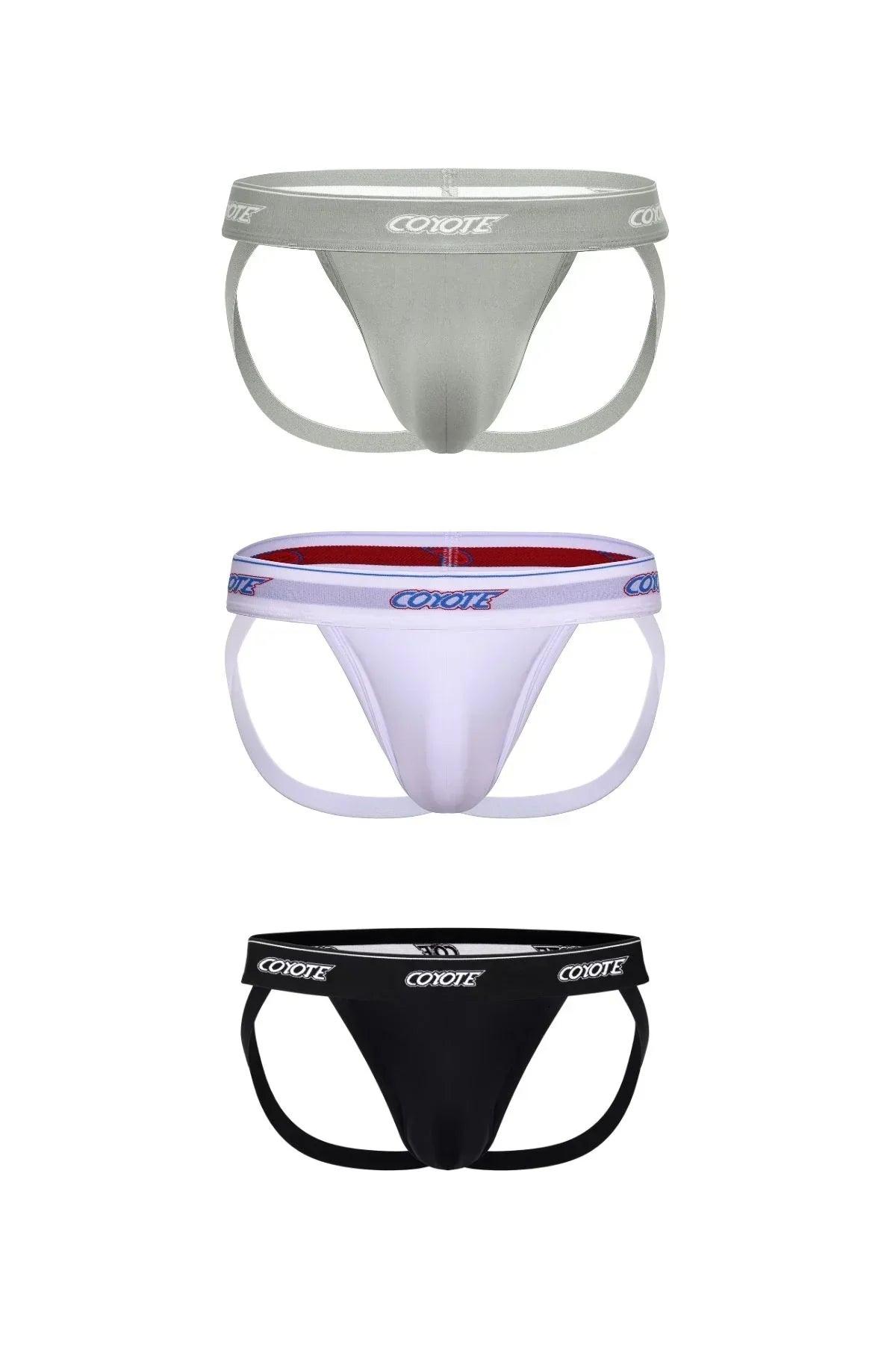 Three men's jockstraps in grey, white, and black with bold logo waistbands, front view.