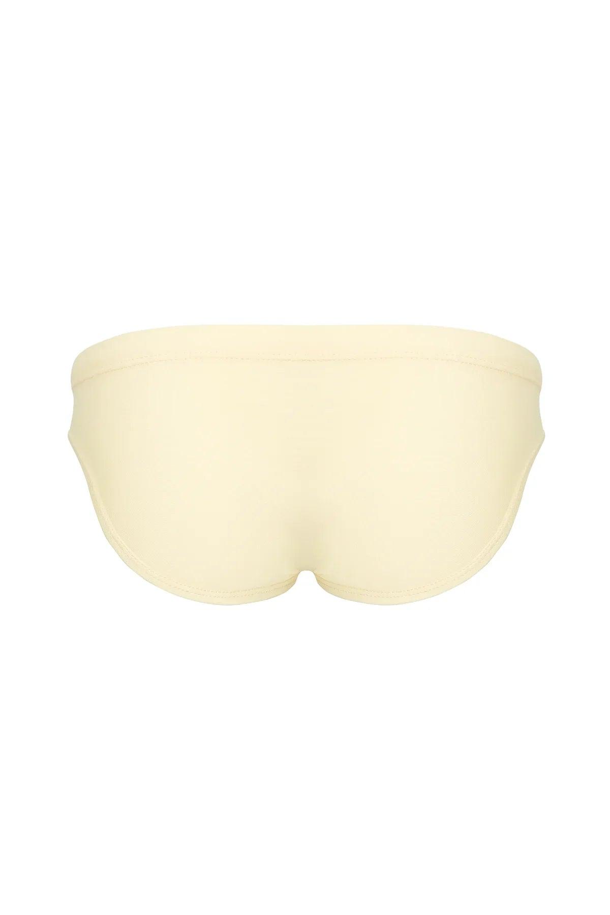 Cream men's low-rise briefs with smooth fabric and contoured fit