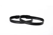 Two black leather armbands with a sleek, stitched design on a white background