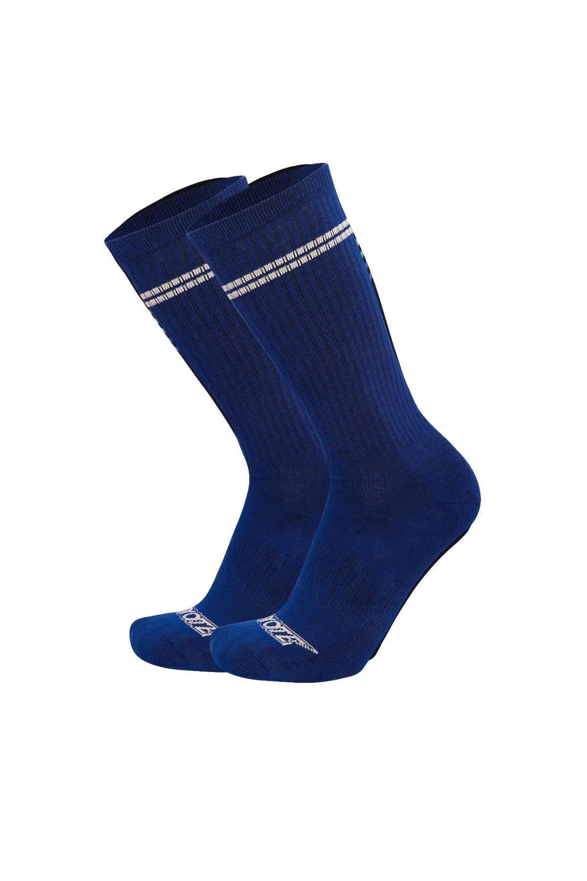 Pair of royal blue athletic crew socks with white stripes and ribbed texture